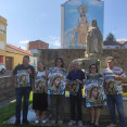 La comision de fiestas con el cartel